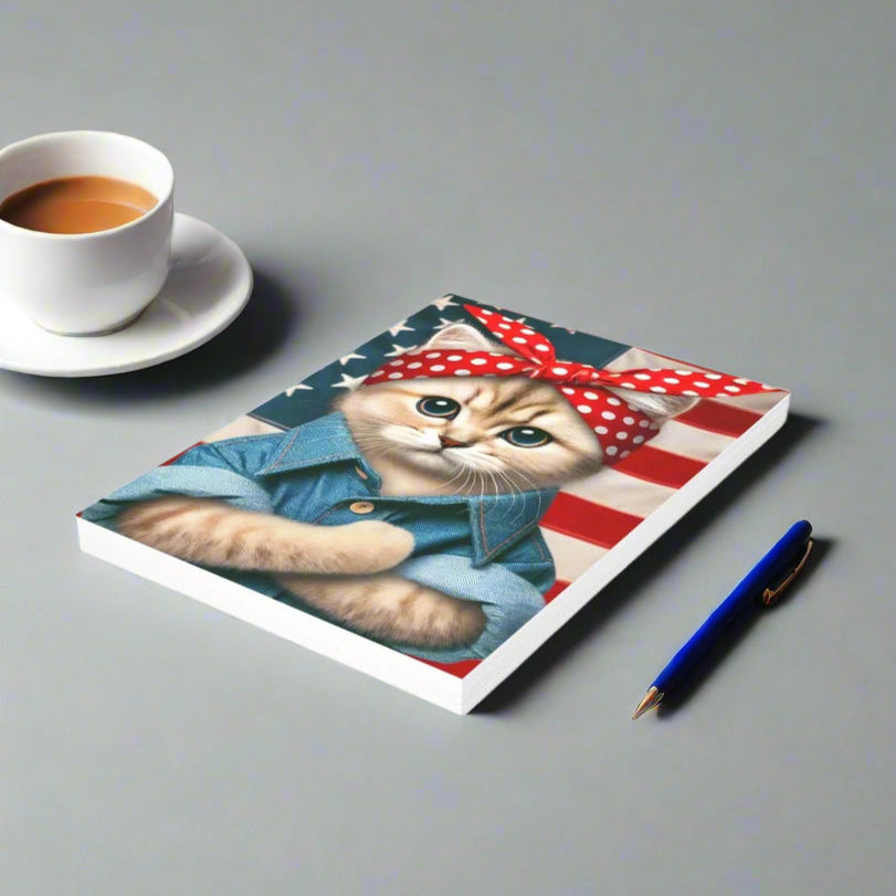 notebook on table with pen and coffee